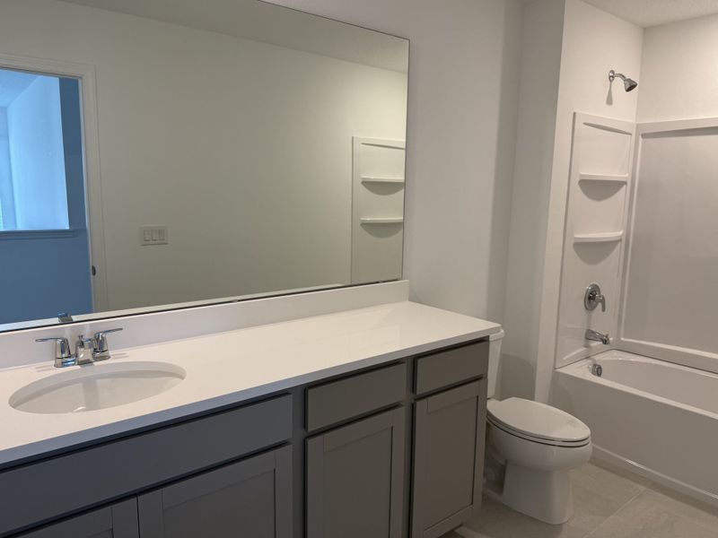 Furnished interior view inside a new home in Trinity Gardens, Deland (Image 4).