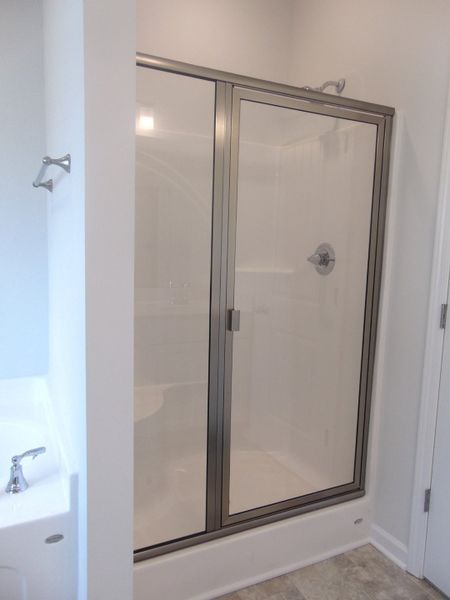 The primary bathroom comes with a two sink, soaking bath tub, shower, and an elongated toilet. The primary bathroom comes with a two sink, soaking bath tub, shower, and an elongated toilet.