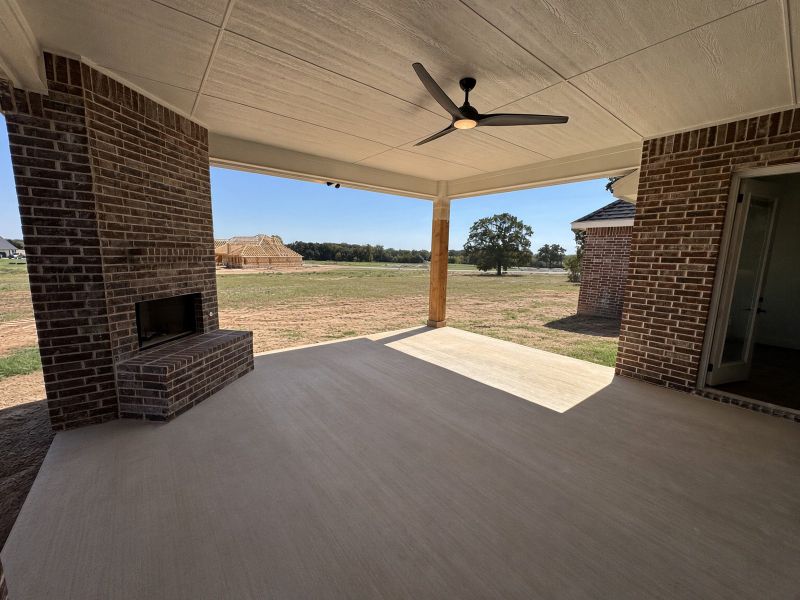 Front exterior of a new home in Overton Oaks, Paradise, TX, highlighting curb appeal (Image 2). Front exterior of a new home in Overton Oaks, Paradise, TX, highlighting curb appeal (Image 2).