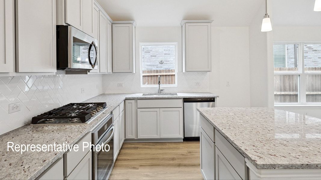 Furnished interior view inside a new home in Green Meadows Premier, Celina (Image 6).