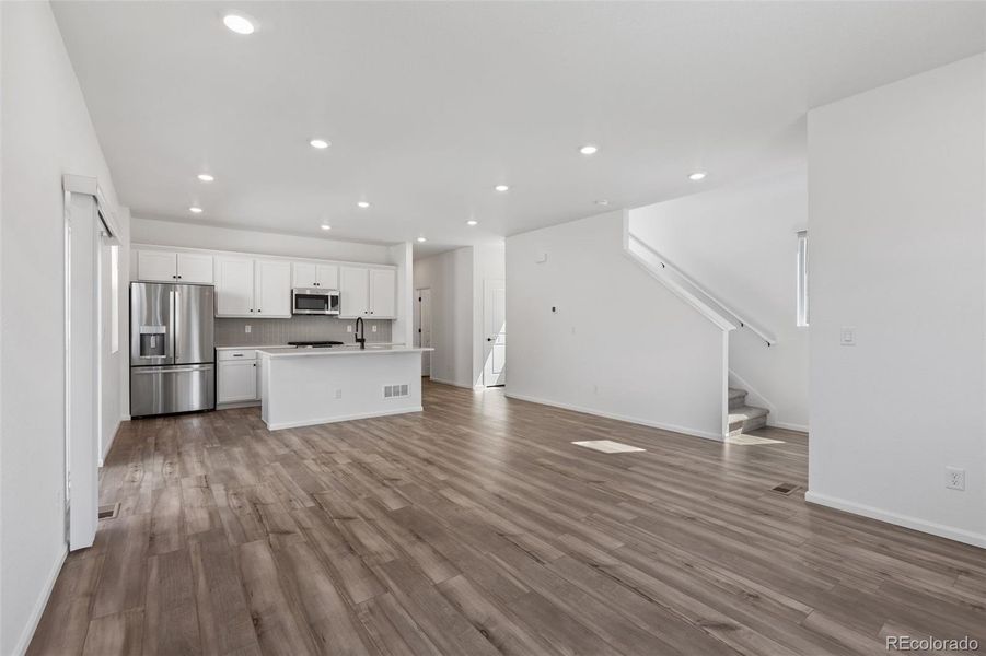 Spacious, unfurnished interior of a new home in Woodrose at Painted Prairie, Aurora (Image 15).