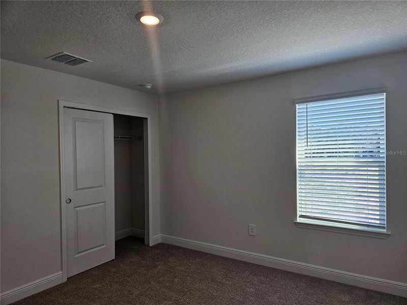 Spacious, unfurnished interior of a new home in The Reserve at Hammock Oaks - Classic Series, Lady Lake (Image 39).