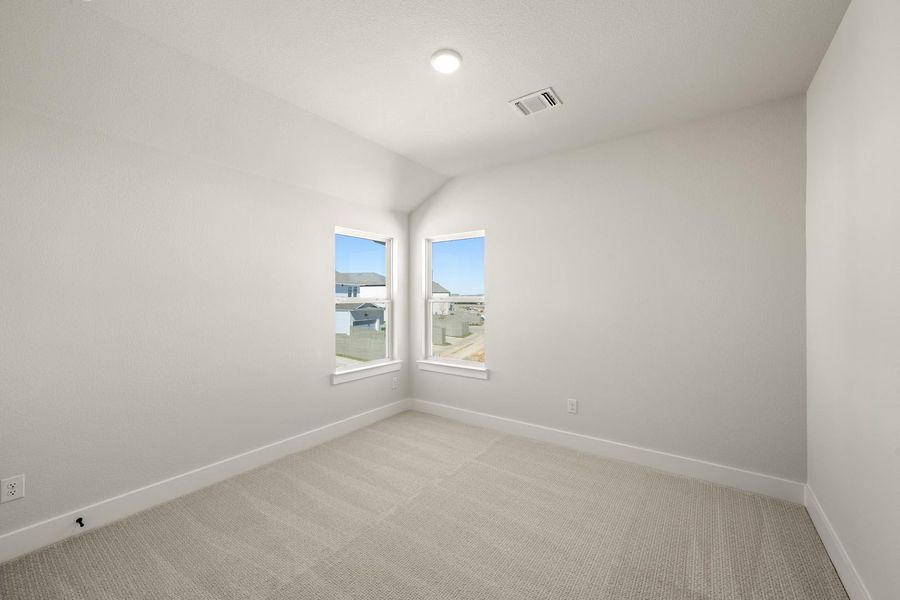 Spacious, unfurnished interior of a new home in The Retreat at Harvest, Argyle (Image 15).