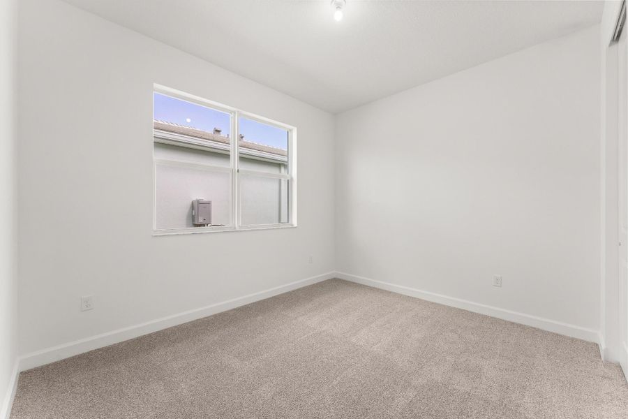 Spacious, unfurnished interior of a new home in Tradition - Telaro, Port St. Lucie (Image 11).