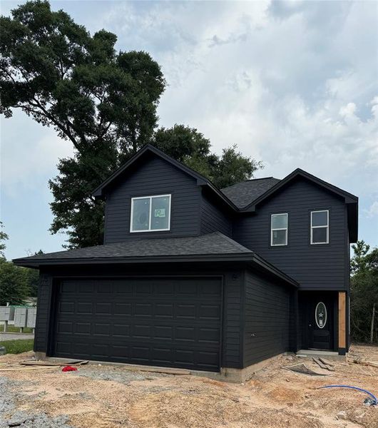 Welcome to this adorable home! The driveway is coming soon as well as cedar shutters upstairs for a pop of color!