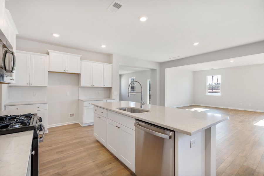 Furnished interior view inside a new home in Sweetgrass at Summers Corner, Summerville (Image 5).