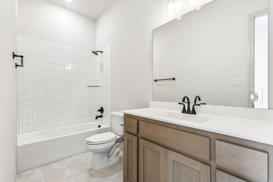 Representative furnished interior of a home built from the Brazos by Sandlin Homes in Bluffs at Northpointe, Fort Worth (Image 11).