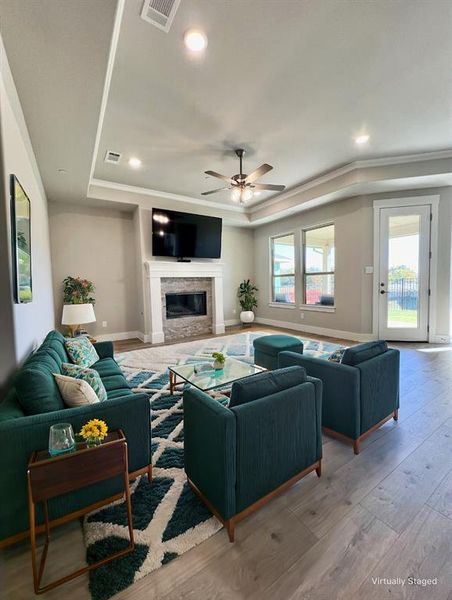 Good-looking family room open layout to kitchen, great family and entertainment space. Fireplace insert will add warm ambience with the flip of a switch. Light and bright with premium lot view of neighborhood water featurein your back yard.