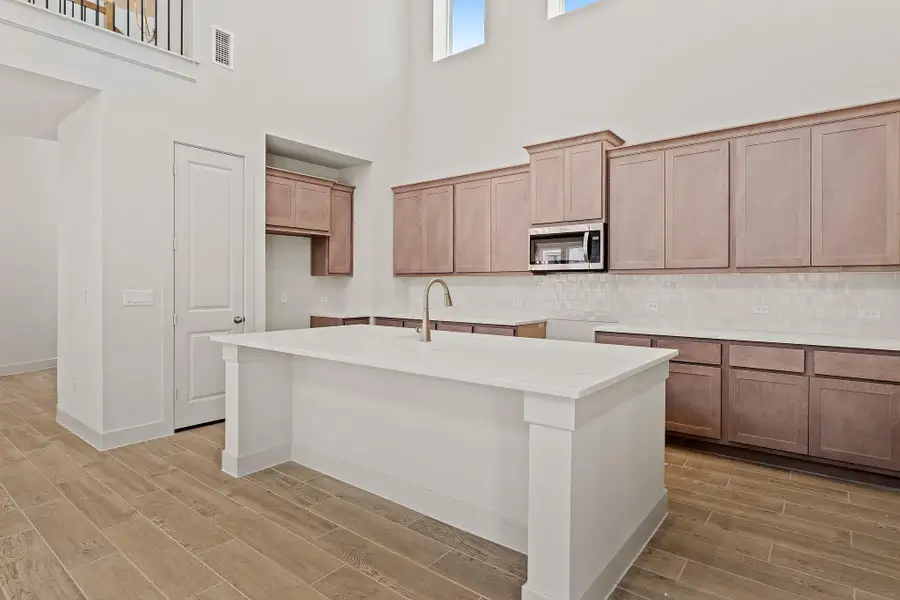Furnished interior view inside a new home in Parmer Ranch, Georgetown (Image 11).