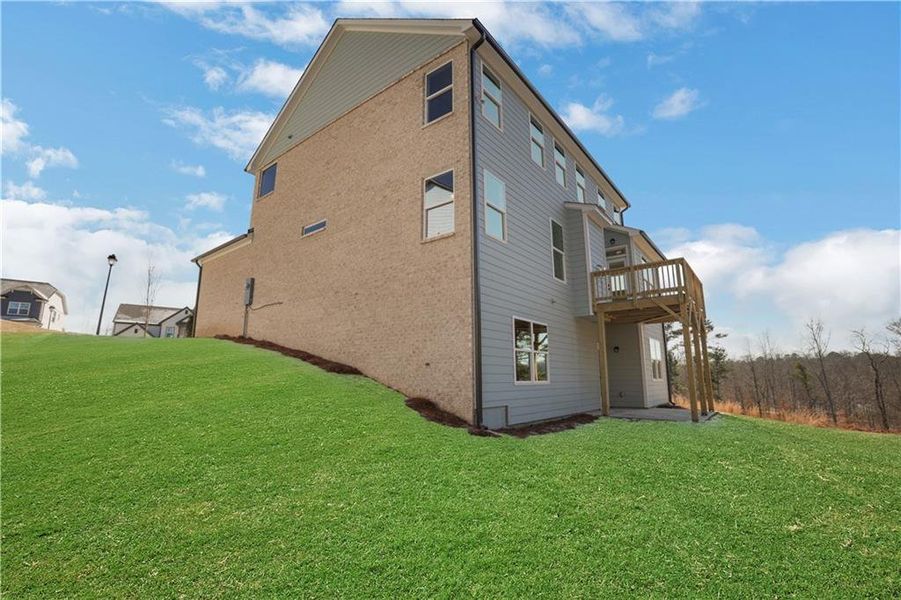 Exterior details and patio area of a home in Cambridge, Flowery Branch (Image 4).