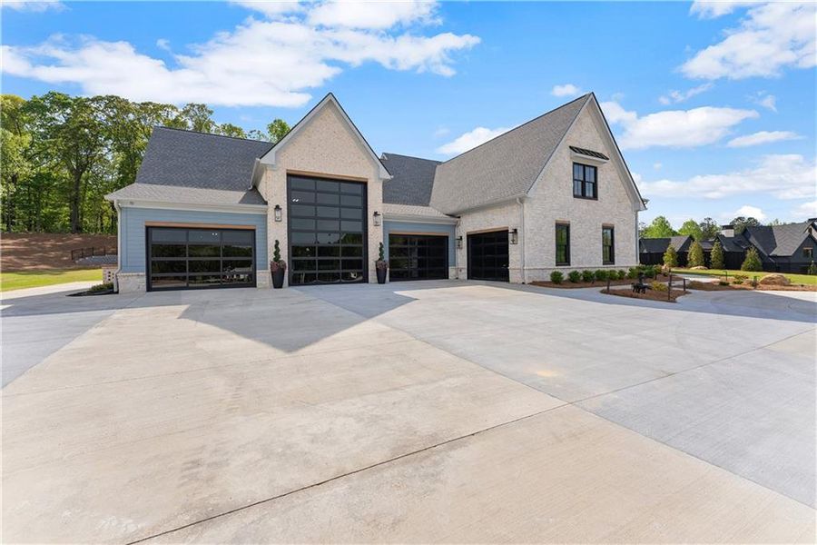 Front exterior of a new home in , Jefferson, GA, highlighting curb appeal (Image 31).