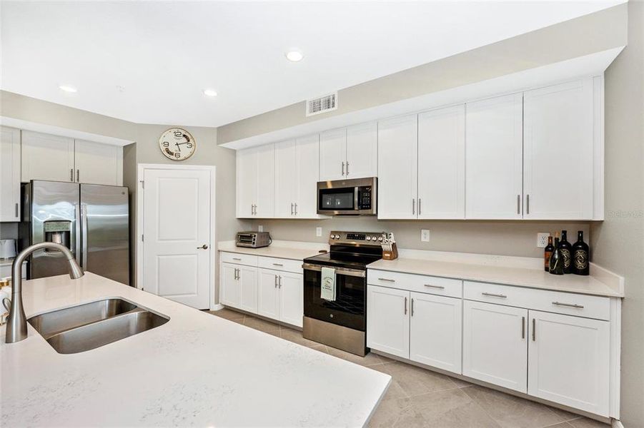 Furnished interior view inside a new home in Wellen Park Golf & Country Club, Venice (Image 14).
