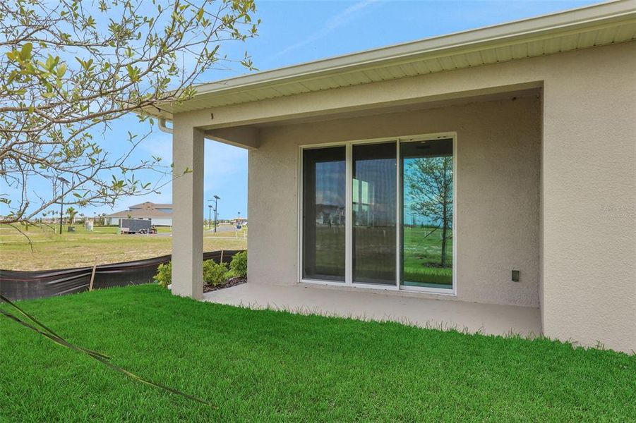 Exterior details and patio area of a home in Seaire, Parrish (Image 18). Exterior details and patio area of a home in Seaire, Parrish (Image 18).