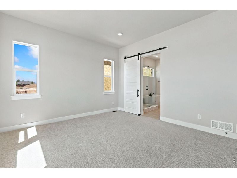 Spacious, unfurnished interior of a new home in RainDance, Windsor (Image 12).
