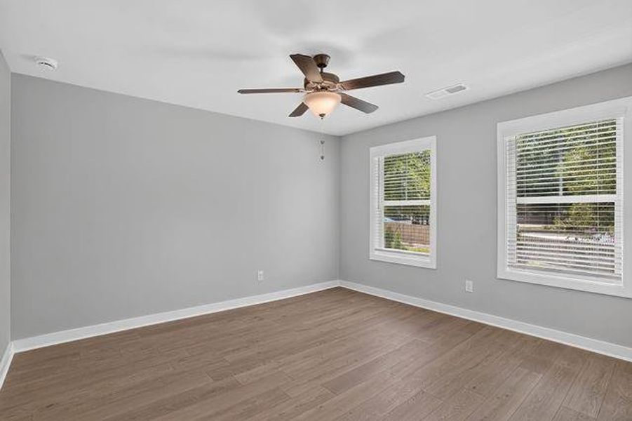 Spacious, unfurnished interior of a new home in The Cottages at East Lanier, Fayetteville (Image 12).