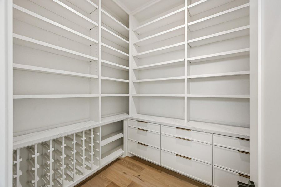 Opposite the mudroom is this fantastic working pantry!