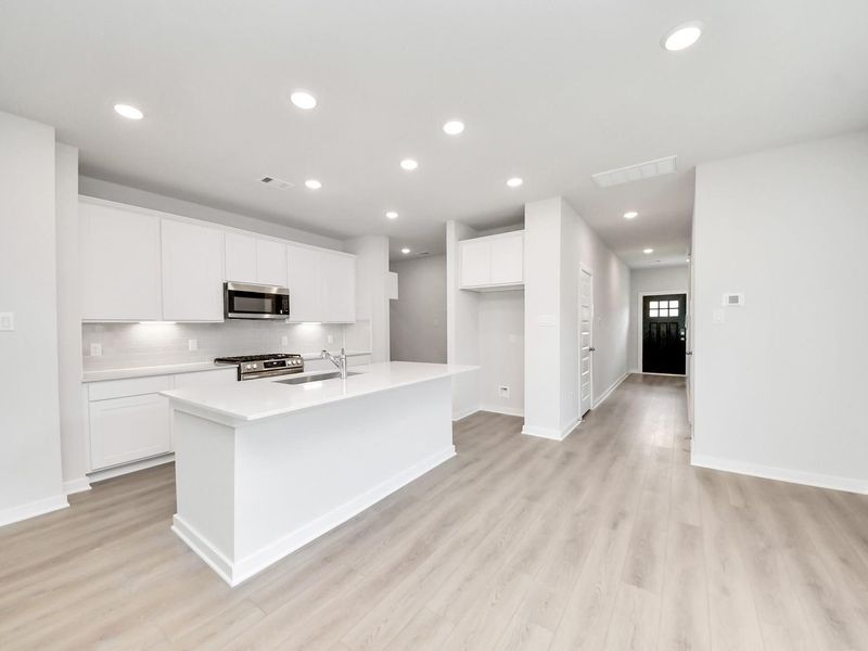Furnished interior view inside a new home in Caney Creek Place, Conroe (Image 5).