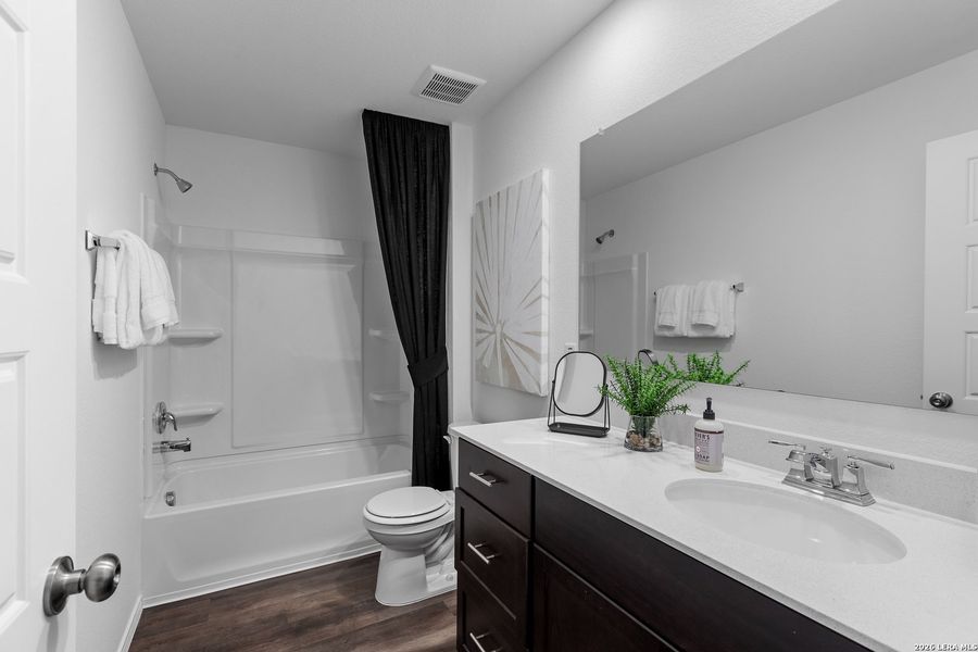 Furnished interior view inside a new home in Cinco Lakes, San Antonio (Image 15).