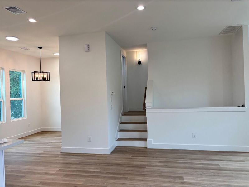 Half bath located up those steps from the living area