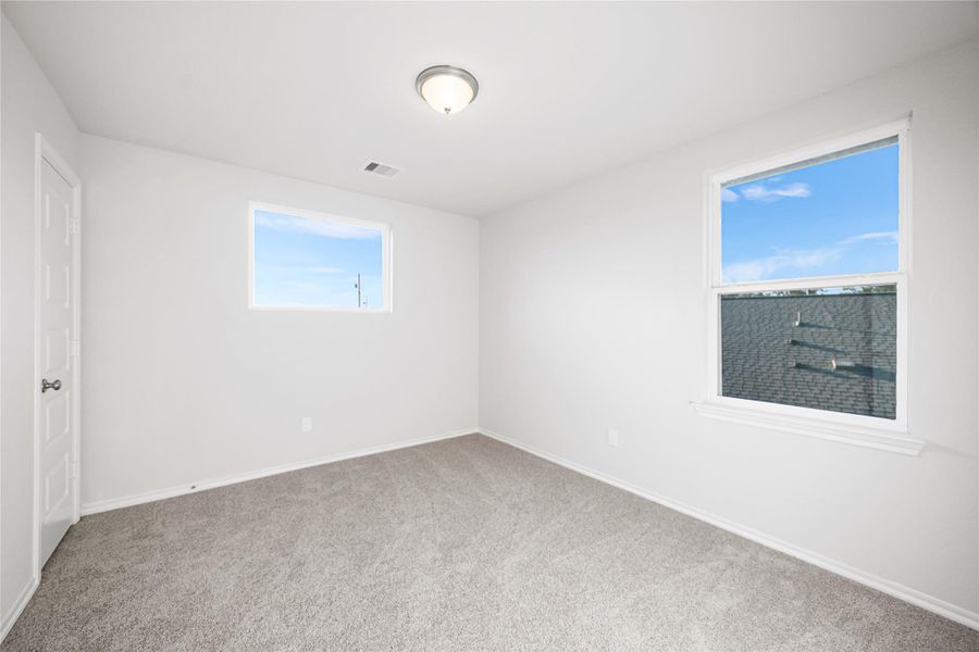 Spacious, unfurnished interior of a new home in Hill & Dale Ranch, Splendora (Image 5).