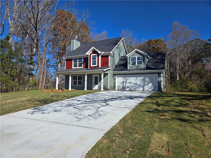 Front exterior of a new home in , Gainesville, GA, highlighting curb appeal (Image 1). Front exterior of a new home in , Gainesville, GA, highlighting curb appeal (Image 1).