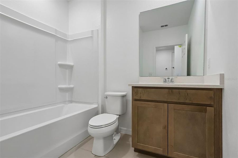 Furnished interior view inside a new home in Eagletail Landings, Howey-in-the-Hills (Image 6).