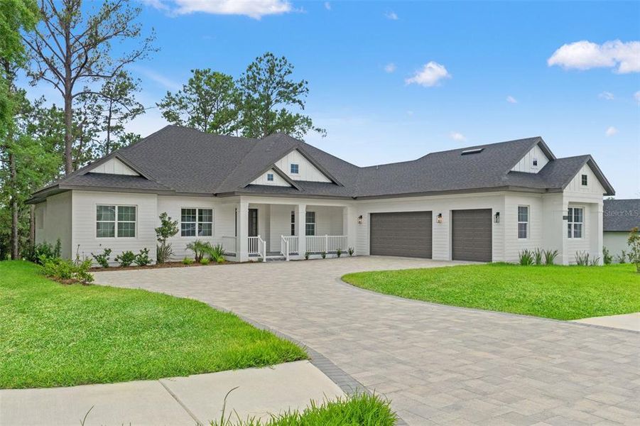 Front exterior of a new home in Southern Hills Plantation, Brooksville, FL, highlighting curb appeal (Image 1).