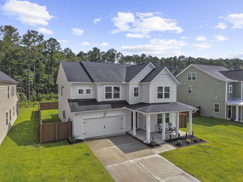 Front exterior of a new home in , Summerville, SC, highlighting curb appeal (Image 1). Front exterior of a new home in , Summerville, SC, highlighting curb appeal (Image 1).