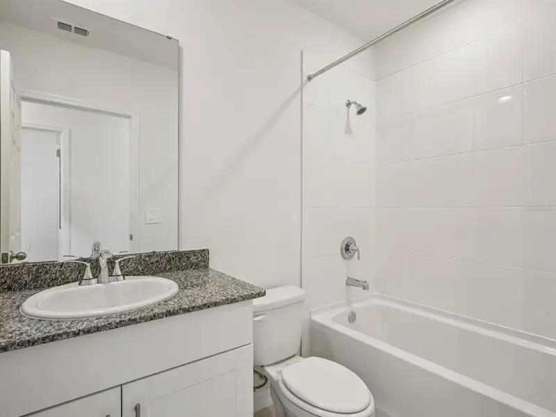 Furnished interior view inside a new home in Villamar - Signature Series, Winter Haven (Image 7).