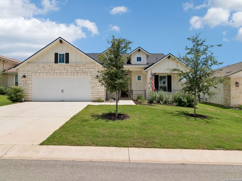 Front exterior of a new home in Kissing Tree, San Marcos, TX, highlighting curb appeal (Image 22). Front exterior of a new home in Kissing Tree, San Marcos, TX, highlighting curb appeal (Image 22).