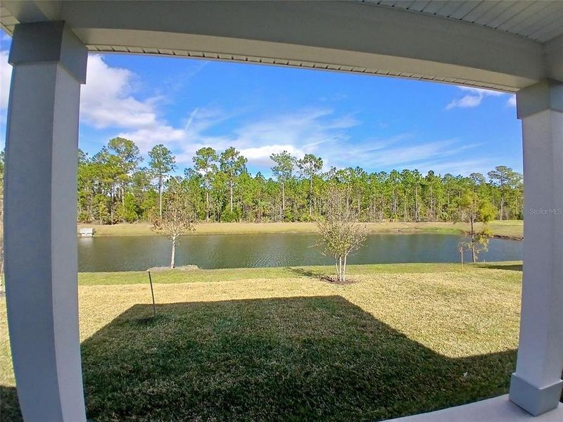 Exterior details and patio area of a home in Magnolia Series at Seminole Palms, Palm Coast (Image 3).