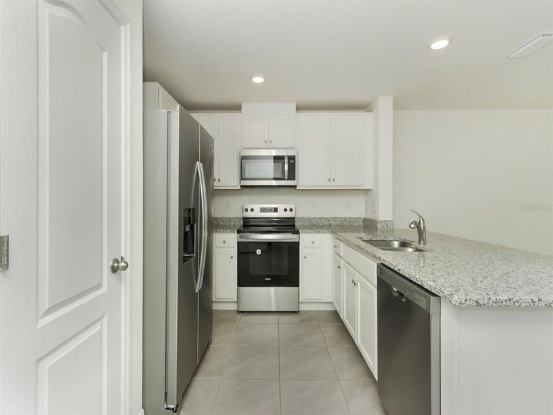 Furnished interior view inside a new home in , Harmony (Image 11).