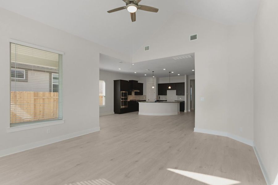 Representative unfurnished interior of a home built from the Maddy by Chesmar Homes in Highland Village, Georgetown (Image 6).