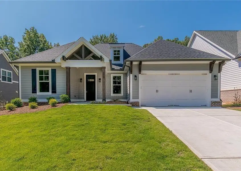 Front exterior of a new home in , Gainesville, GA, highlighting curb appeal (Image 1). Front exterior of a new home in , Gainesville, GA, highlighting curb appeal (Image 1).