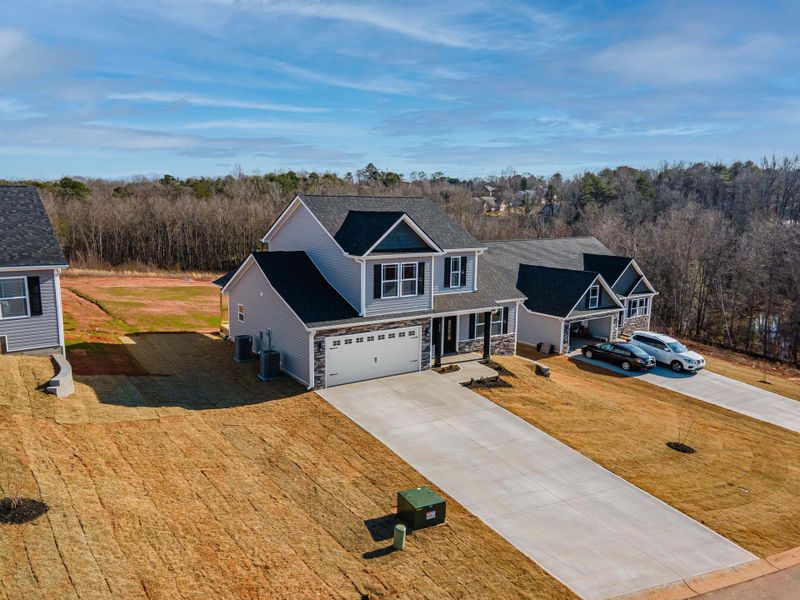 Representative exterior photo of a completed home built from the Sumter by Enchanted Homes in Lonesome Dove, San Antonio, TX (Image 34).