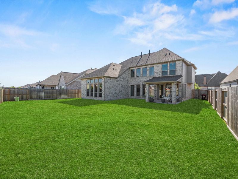 Lovely, wide backyard. Room to add a pool, putting green or a 'half-court' maybe??