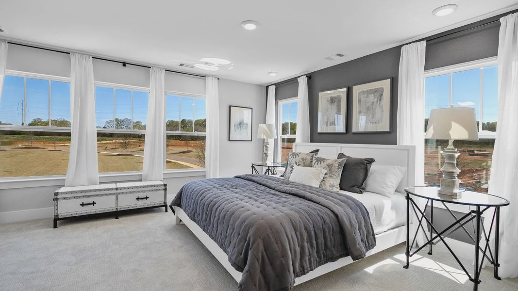 Luxe 2 story townhomes with garage,  elevated ceilings, walk-in closets, & 9-foot kitchen island near Downtown Greenville, SC