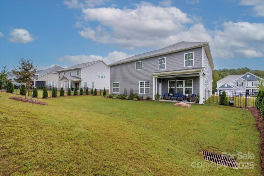Exterior details and patio area of a home in , Troutman (Image 22).