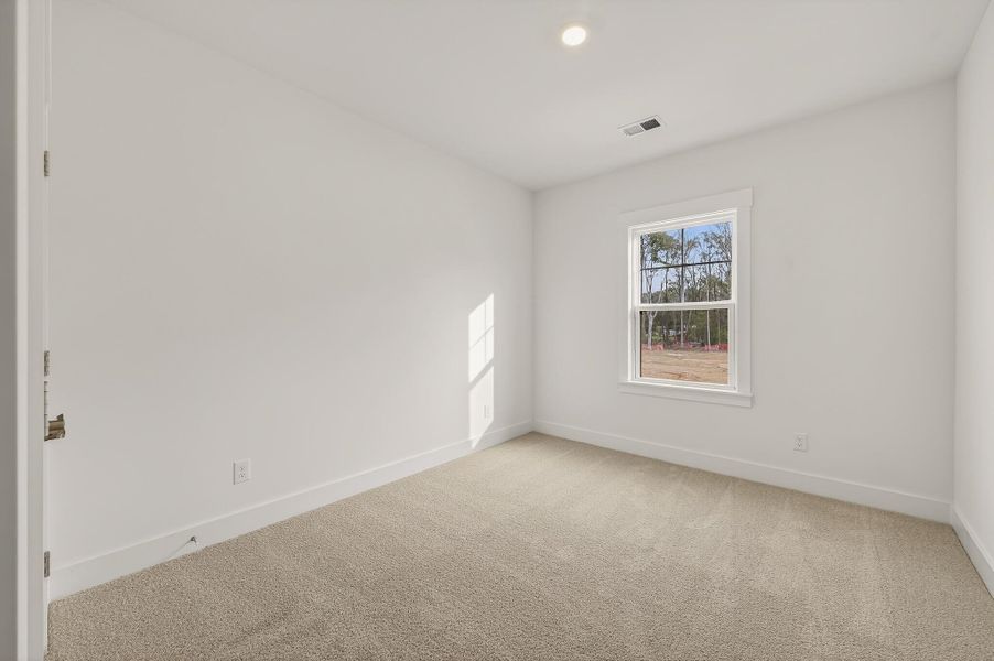 Spacious, unfurnished interior of a new home in Indigo Place, North Charleston (Image 30).