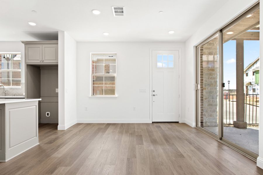 Spacious, unfurnished interior of a new home in The Tribute, The Colony (Image 22).