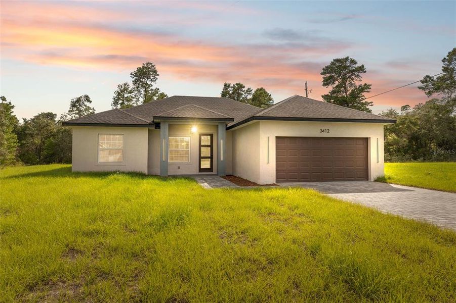 Front exterior of a new home in , Ocala, FL, highlighting curb appeal (Image 20).