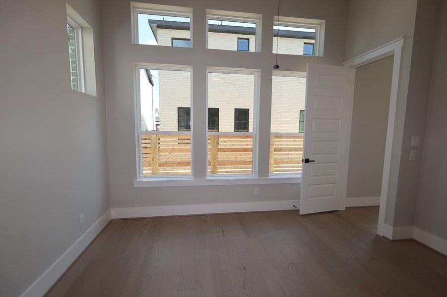 Spacious, unfurnished interior of a new home in Easthaven at Bridgeland Central - Horizon Collection, Cypress (Image 12).