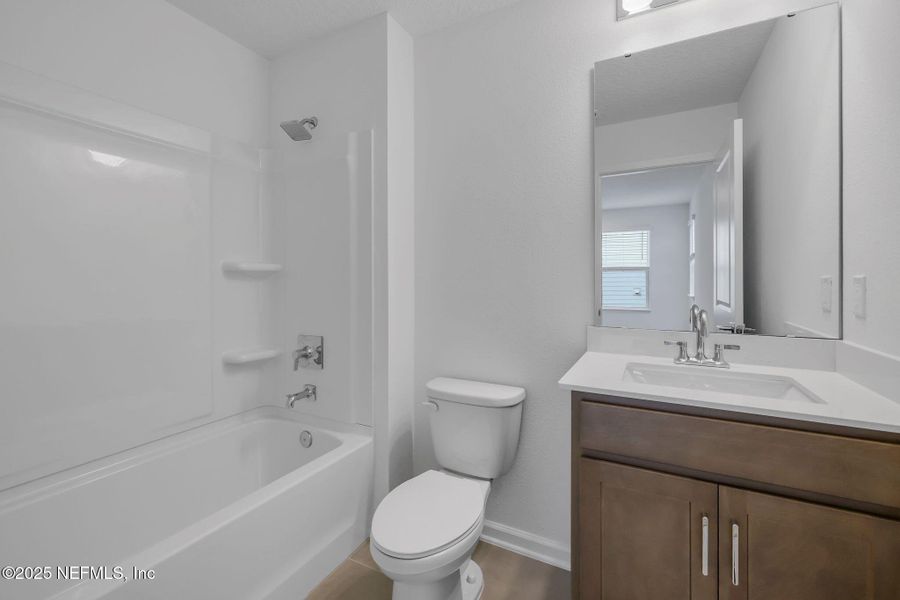 Furnished interior view inside a new home in Brook Forest, St. Augustine (Image 5).