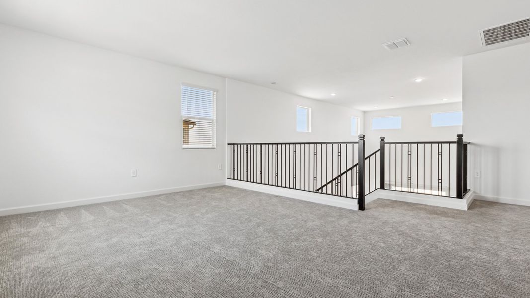 Representative unfurnished interior of a home built from the Phoenician by D.R. Horton in The Ridge at Stone Butte, Phoenix (Image 28). Representative unfurnished interior of a home built from the Phoenician by D.R. Horton in The Ridge at Stone Butte, Phoenix (Image 28).