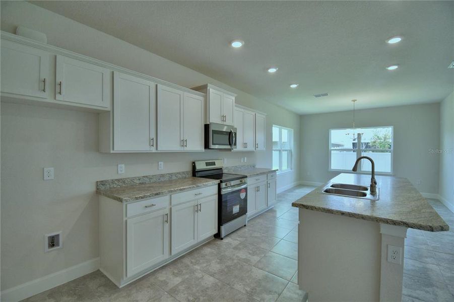 Furnished interior view inside a new home in Villamar, Winter Haven (Image 4). Furnished interior view inside a new home in Villamar, Winter Haven (Image 4).