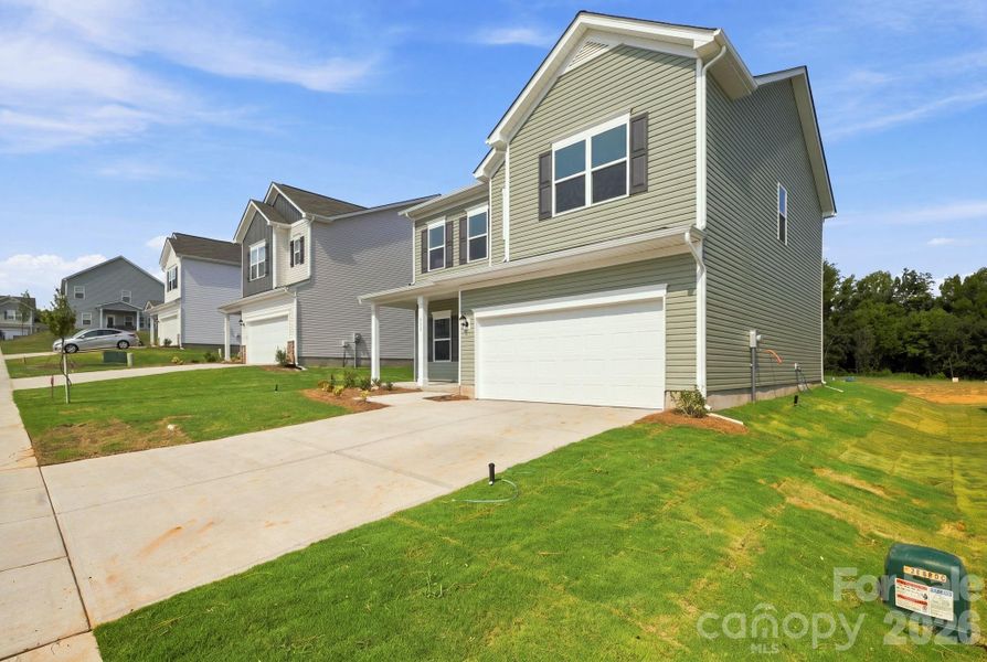 Front exterior of a new home in Catawba Trace, Catawba, NC, highlighting curb appeal (Image 24).