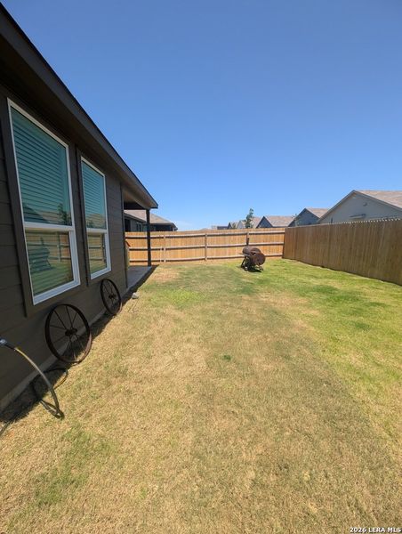 Exterior details and patio area of a home in Rose Valley, Converse (Image 3).