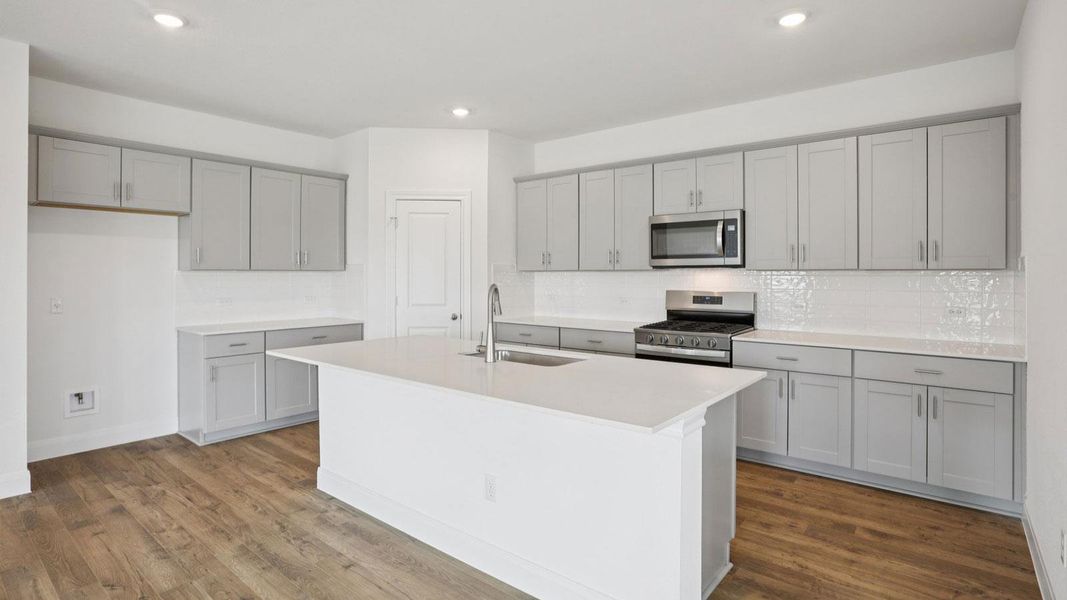 Furnished interior view inside a new home in Railhead, Cedar Creek (Image 6).