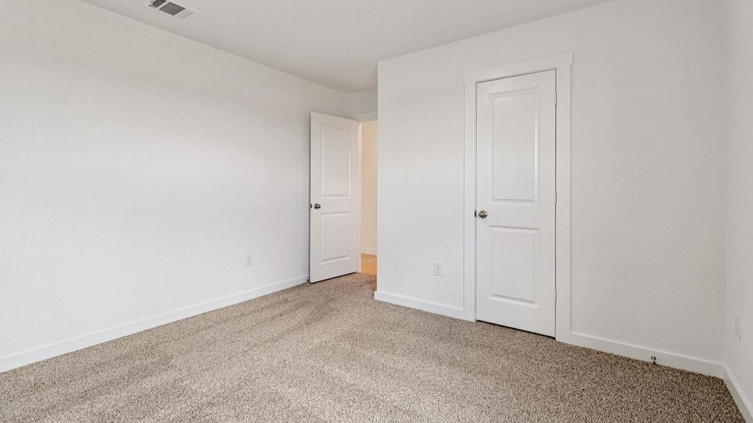 Spacious, unfurnished interior of a new home in Monarch Ranch, Manor (Image 23).