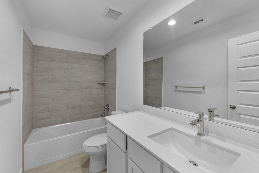 Furnished interior view inside a new home in Cypresswood Landing, Humble (Image 6).